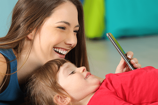 5 Simple Ways to Avoid Fake Mom Influencers 5 Simple Ways to Avoid Fake Mom Influencers - Mother and Child on Phone